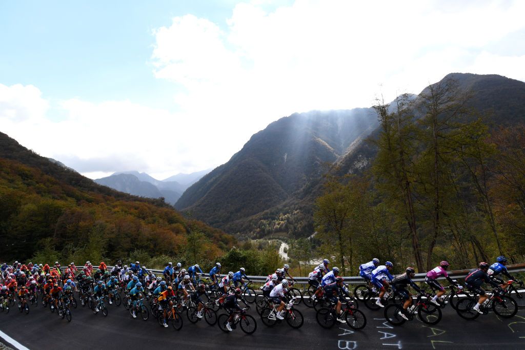 PIANCAVALLO ITALY OCTOBER 18 Arnaud Demare of France and Groupama FDJ Purple Points Jersey Tao Geoghegan Hart of The United Kingdom and Team INEOS Grenadiers Ben Swift of The United Kingdom and Team INEOS Grenadiers Sella Chianzutan 955m Peloton Landscape Mountains during the 103rd Giro dItalia 2020 Stage 15 a 185km stage from Base Aerea Rivolto Frecce Tricolori to Piancavallo 1290m girodiitalia Giro on October 18 2020 in Piancavallo Italy Photo by Tim de WaeleGetty Images