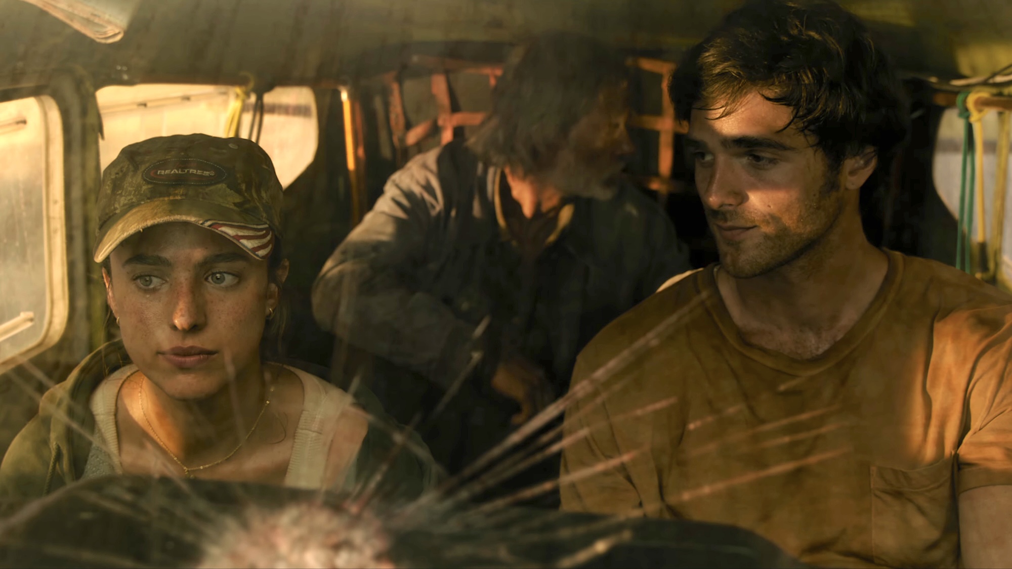 Jacog Elordi, Margaret QUalley and Josh Brolin's characters in small aircraft with cracked windshield in The Dog Stars