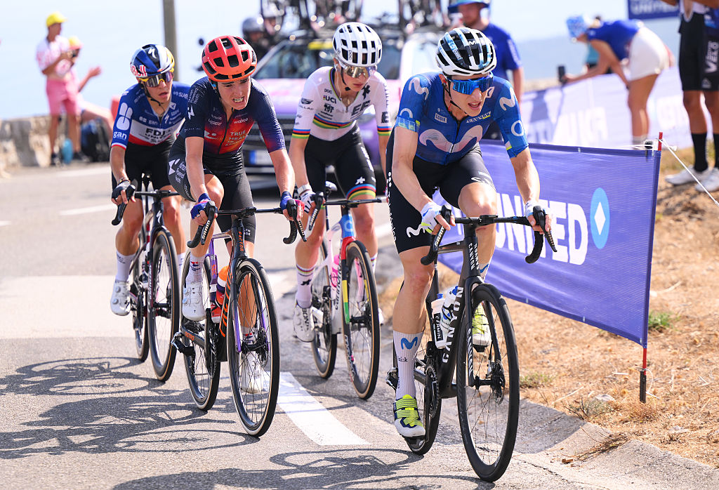 Marlen Reusser (Movistar) rides ahead of three others on a climb during the Tour de France Femmes