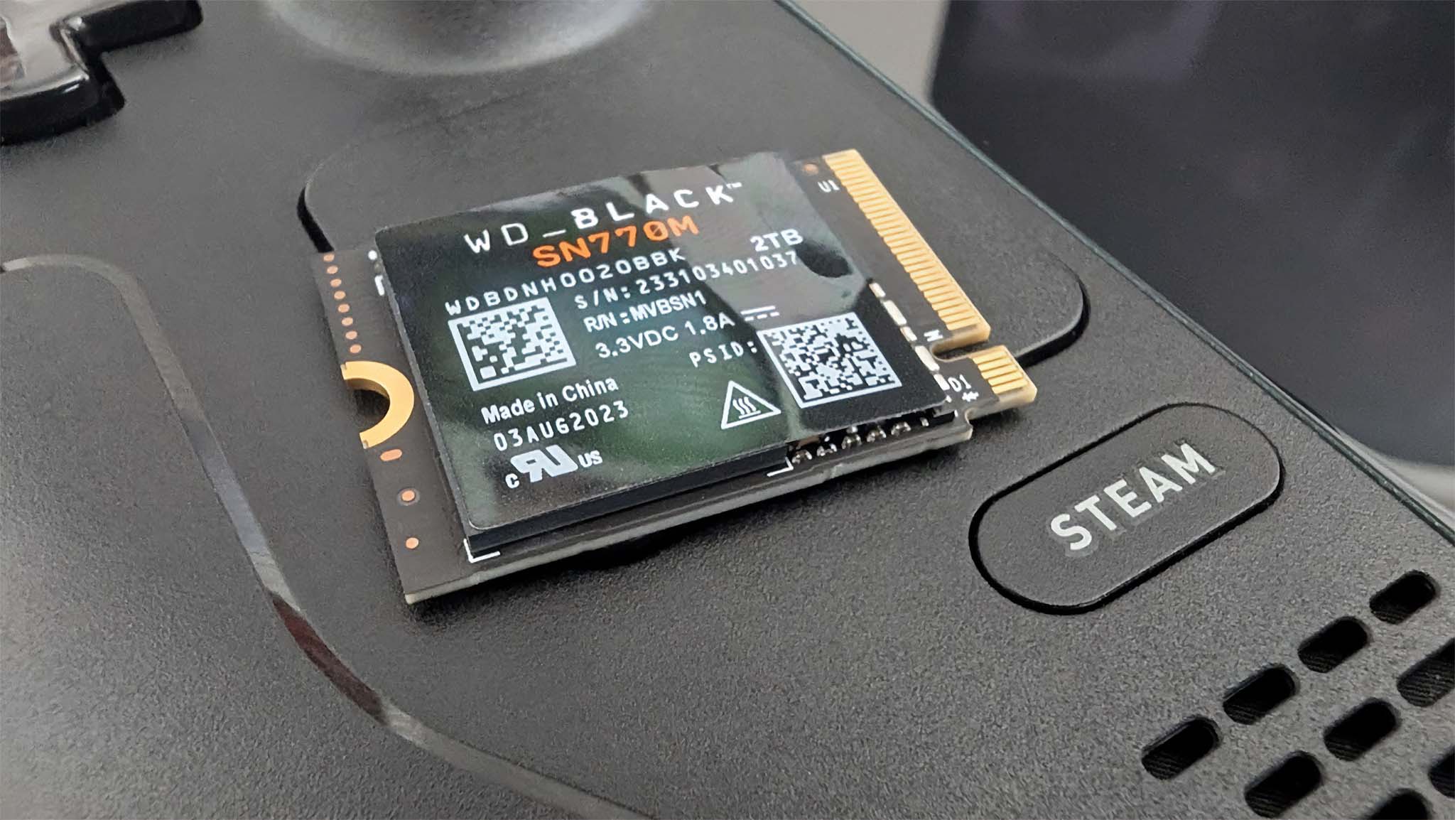Upgrading Steam Deck SSD: SSD on Steam Deck touchpad.