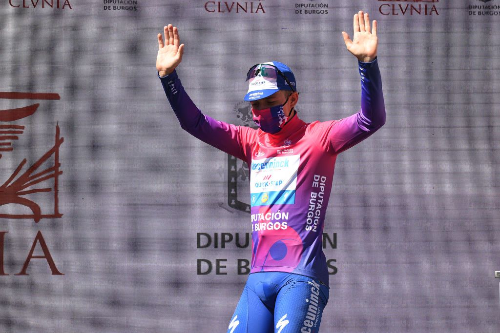 LAGUNAS DE NEILA SPAIN AUGUST 01 Podium Remco Evenepoel of Belgium and Team Deceuninck QuickStep Purple Leader Jersey Celebration during the 42nd Vuelta a Burgos 2020 Stage 5 a 158km stage from Covarrubias to Lagunas de Neila 1872m VueltaBurgos on August 01 2020 in Lagunas de Neila Spain Photo by David RamosGetty Images