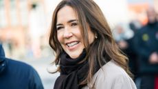 Queen Mary of Denmark smiles during a walk through the city on October 27, 2025 in Randers