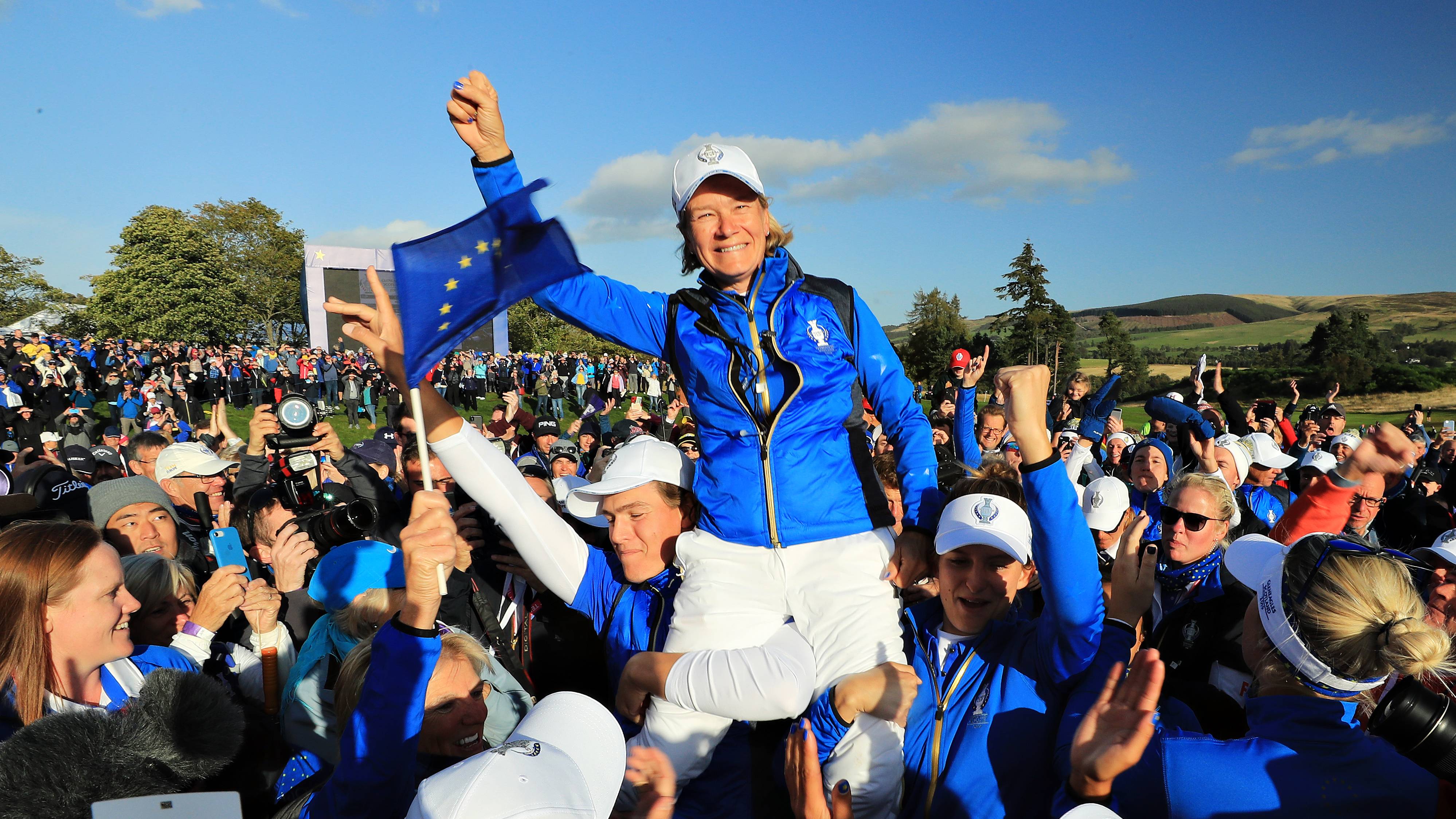 Team Europe captain Catriona Matthew is hoisted onto her players shoulders to celebrate the Solheim Cup win at Gleneagles in 2019