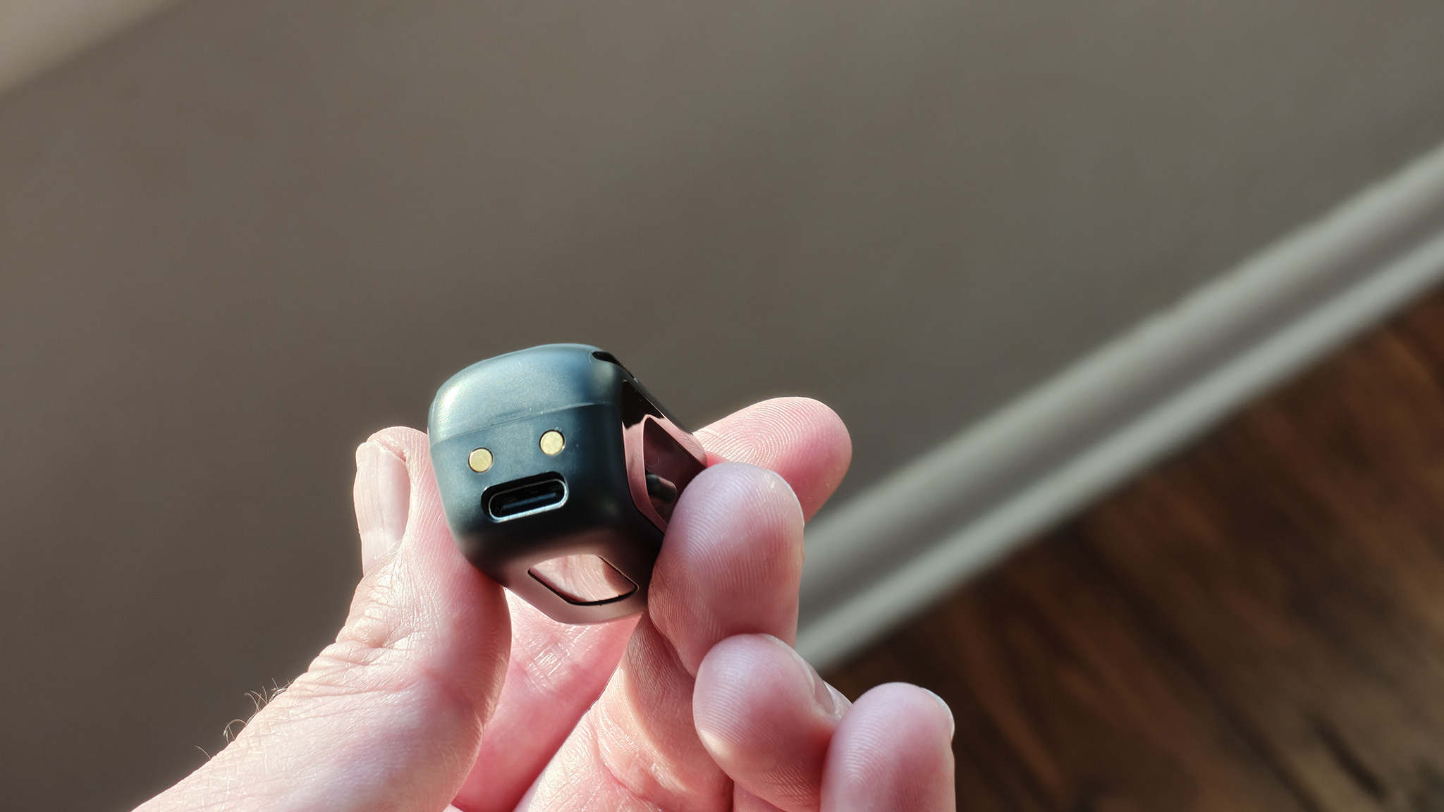 Holding a BoboVR CG2 battery