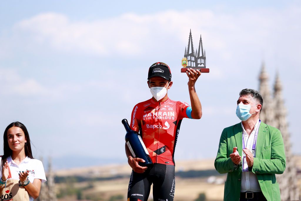BURGOS SPAIN AUGUST 02 Santiago Buitrago Sanchez of Colombia and Team Bahrain Victorious celebrates winning the stage on the podium ceremony after the 44th Vuelta a Burgos 2022 Stage 1 a 157km stage from Catedral de Burgos to Mirador del Castillo Burgos VueltaBurgos on August 02 2022 in Burgos Spain Photo by Gonzalo Arroyo MorenoGetty Images