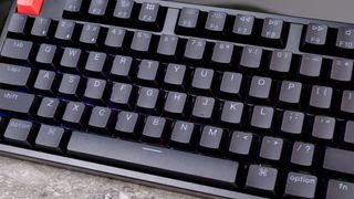 A black Keychron K10 V2 mechanical custom keyboard