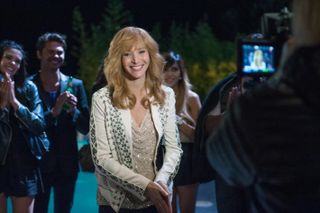 lisa kudrow as valerie cherish smiling for the paparazzi in the comeback