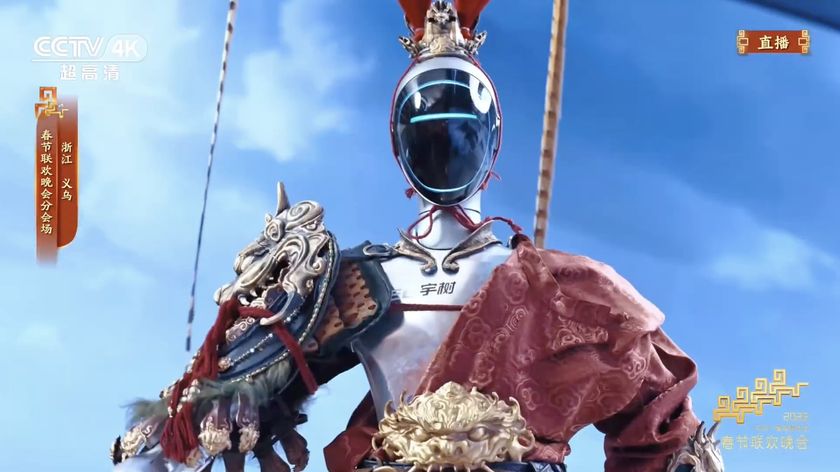 Unitree's humanoid robot donning traditional wear in a kung-fu demonstration