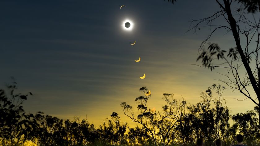 Solar eclipse composite with observers in the foreground - lower right corner. above the stages of a total solar eclipse play out in the sky above.