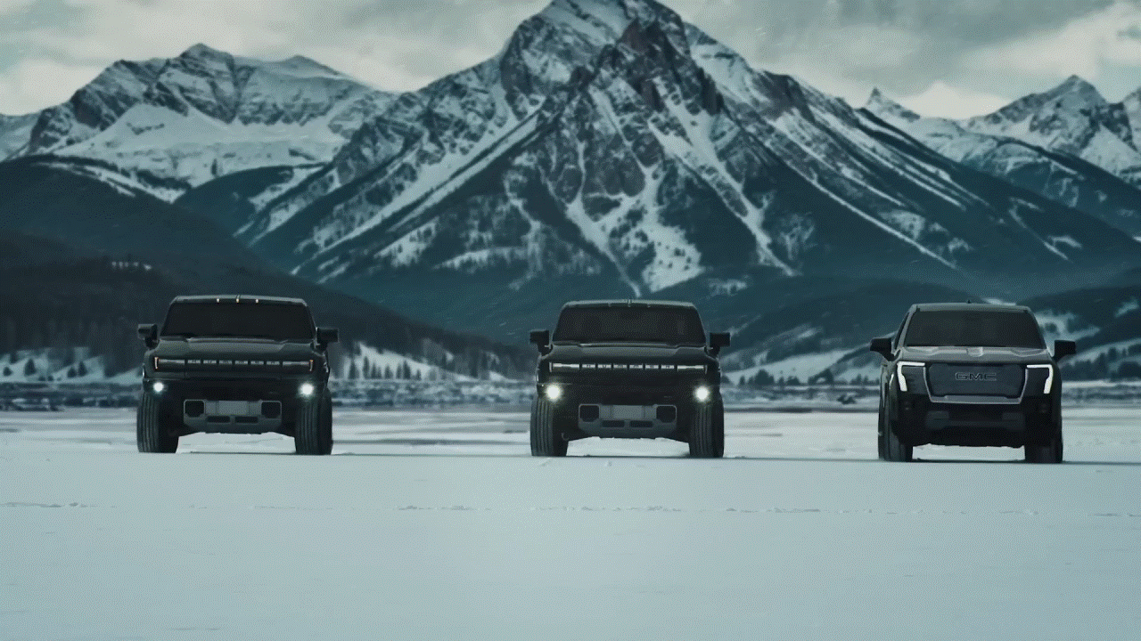 GMC Sierra EV and Hummer EV crabwalking together.