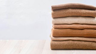 Pile of cashmere sweaters