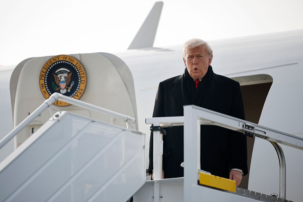 U.S. President Donald Trump disembarks Air Force One as he arrives at Zurich Airport before attending the World Economic Forum (WEF) in Davos