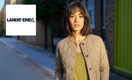 Model wearing Land's end green jacket and top