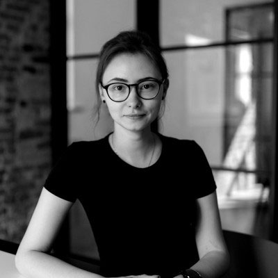 black and white headshot of interior designer Evelina Juzėnaitė