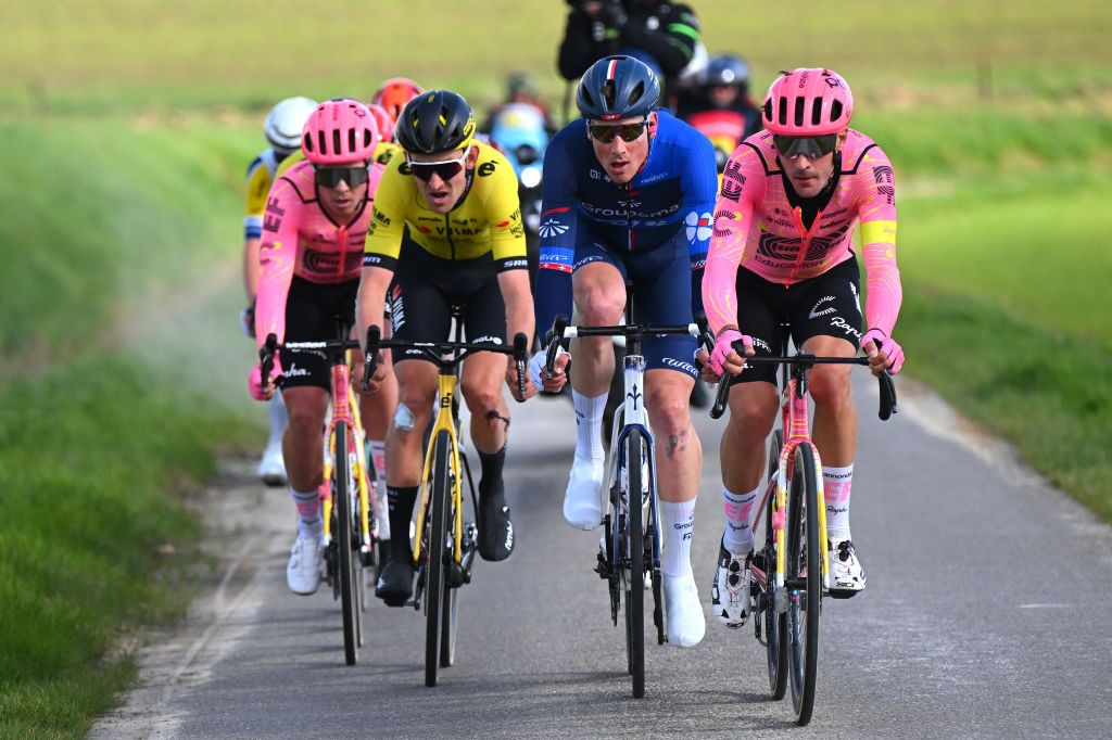 WAREGEM BELGIUM MARCH 27 LR Tiesj Benoot of Belgium and Team Visma Lease a Bike Stefan Kung of Switzerland and Team Groupama FDJ and Alberto Bettiol of Italy and Team EF Education EasyPost compete in the chase group during the 78th Dwars Door Vlaanderen 2024 Mens Elite a 1886km one day race from Roeselare to Waregem UCIWT on March 27 2024 in Waregem Belgium Photo by Tim de WaeleGetty Images