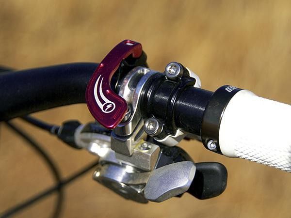 The bar-mounted remote includes a large paddle for easy access in dicey terrain.