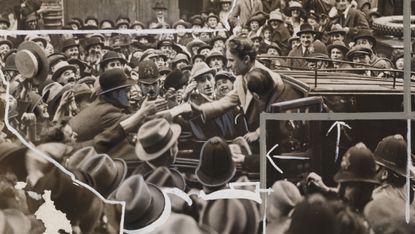 Charlie Chaplin surrounded by fans 