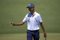Amateur Fifa Laopakdee of Thailand reacts to a putt on the second hole during the first round of the 2026 Masters Tournament at Augusta National Golf Club on April 09, 2026 in Augusta, Georgia.