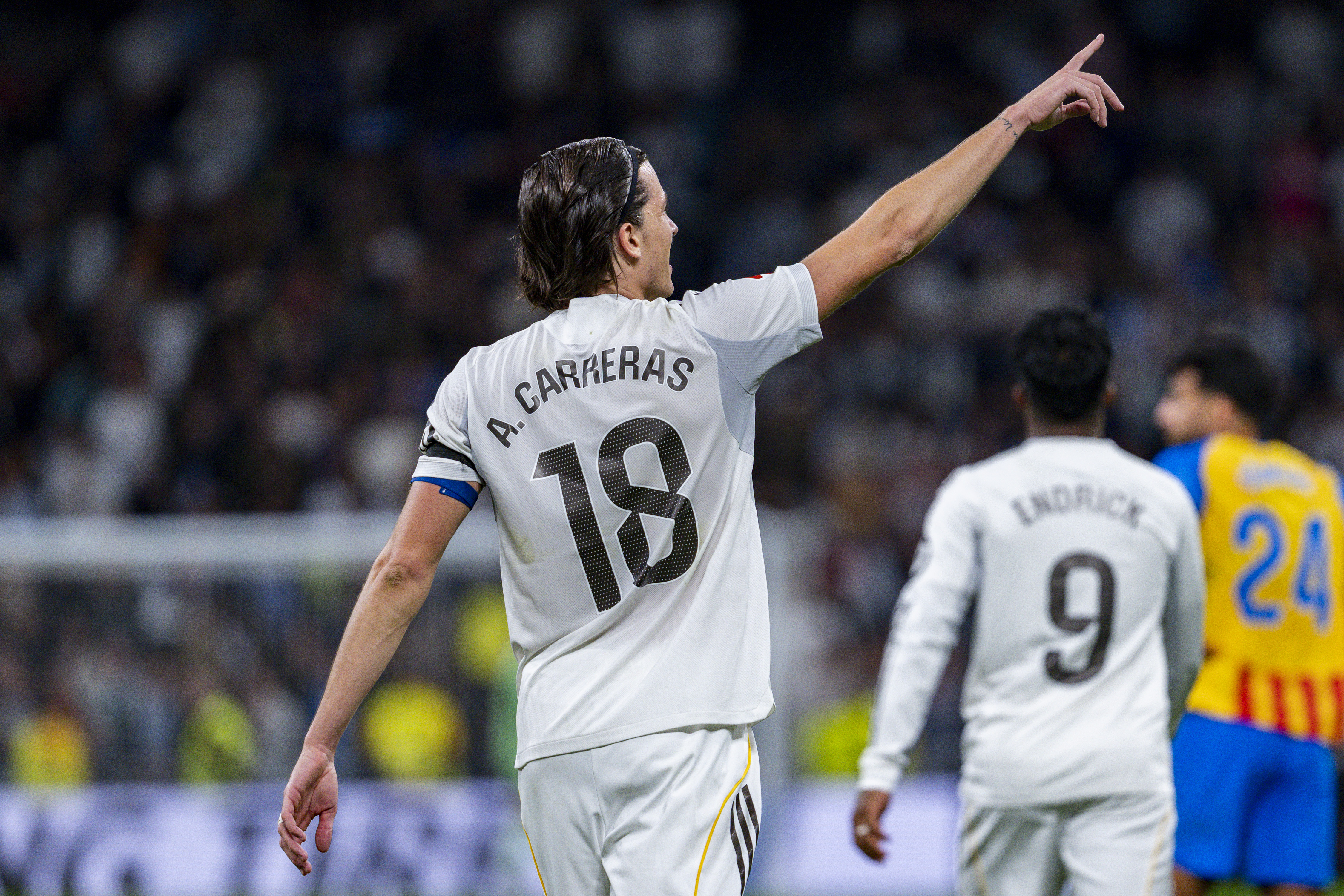 Alvaro Carreras celebrates after scoring for Real Madrid against Valencia