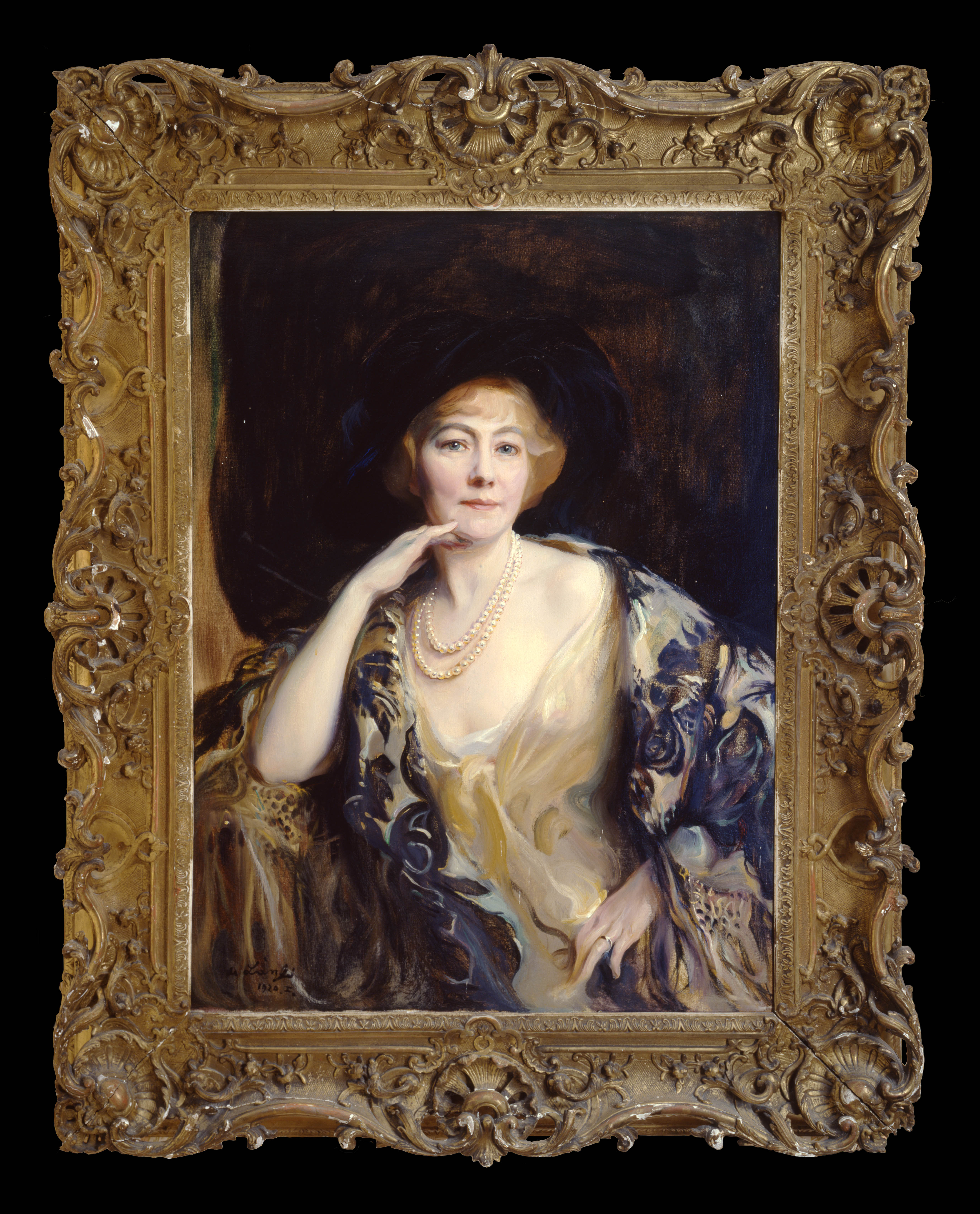A portrait of Mrs Harold Nickols wearing a two-string of blush-pink pearls