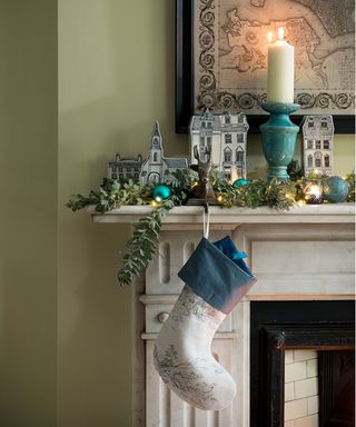 Christmas bedroom decor ideas with fireplace with baubles and stocking