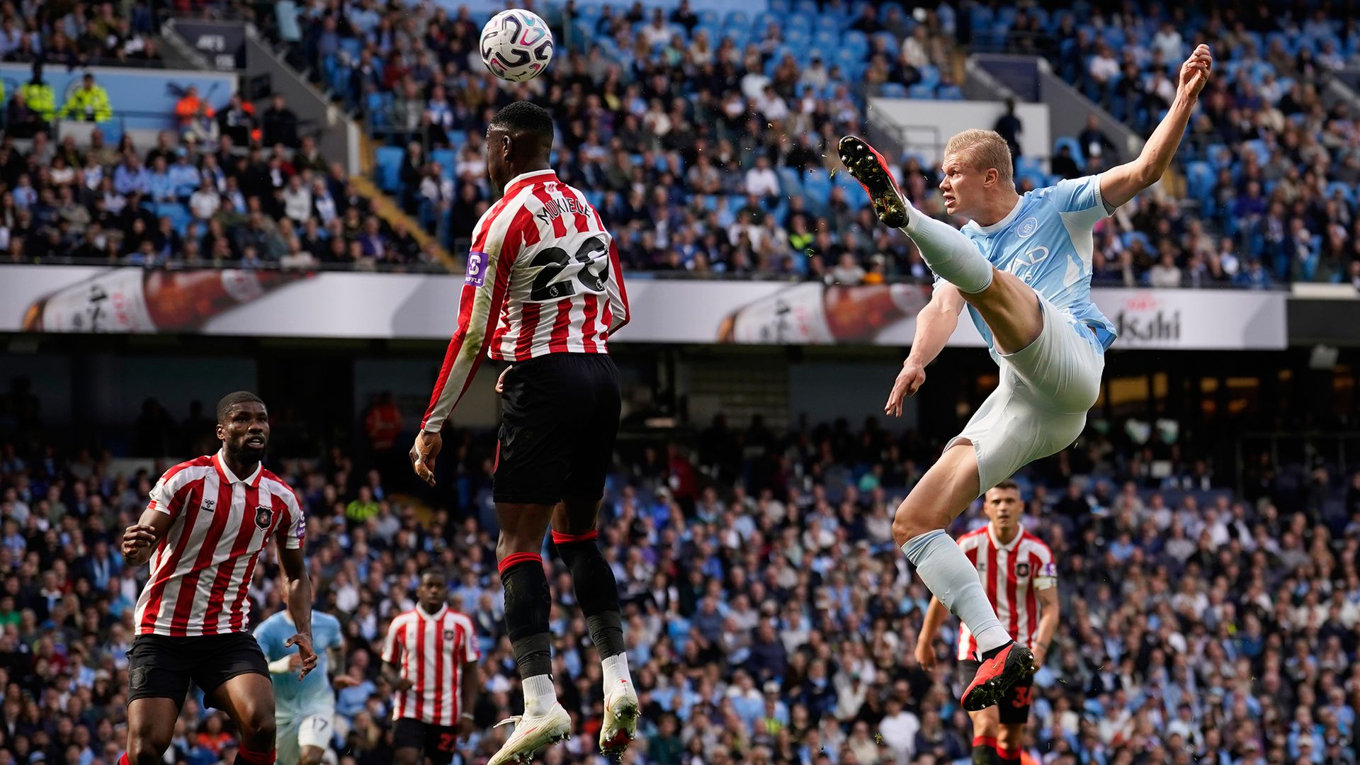 
                                Manchester City's Erling Haaland shoots during an English Premier League soccer match against Sunderland in Manchester, England
                            