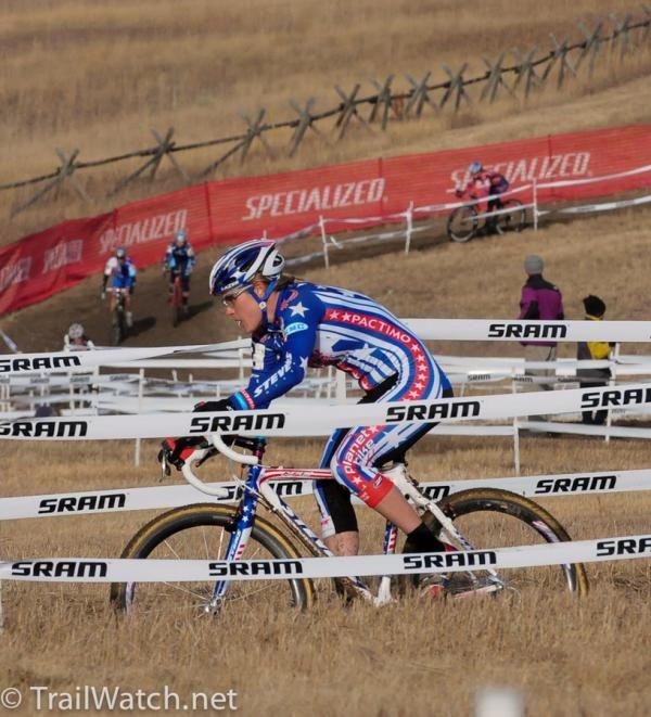 Katie Compton (Planet Bike) riding through typical Front Range landscape.