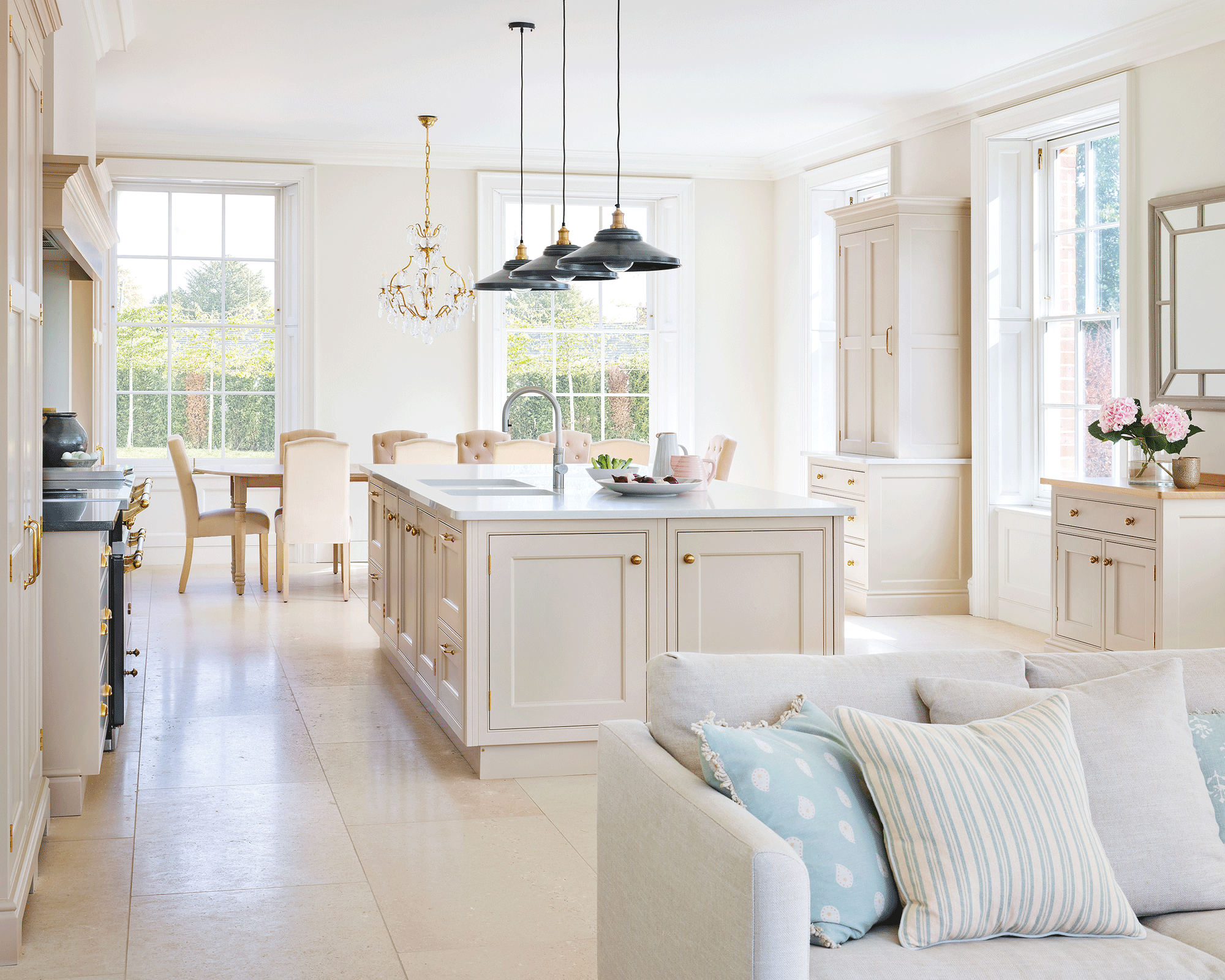 A country style painted kitchen with cream cabinetry