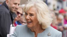 Queen Camilla during a tour of the market square in Selkirk, in the Scottish Borders, as part of the first Holyrood Week since the King's coronation, on July 6, 2023 in Selkirk, Scotland. The British Royal family will carry out traditional engagements in Scotland until Thursday. This includes the presentation of the Honours of Scotland to King Charles III and Queen Camilla at a National Service of Thanksgiving on July 05. 