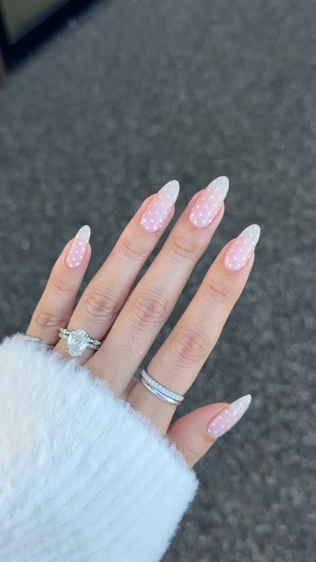Sheer nails with white polka dots