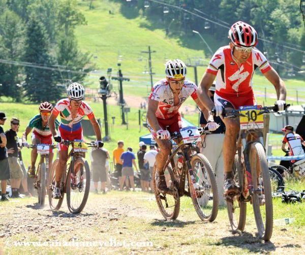 Christoph Sauser and Nino Schurter on the climb.