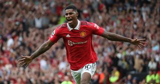 Manchester United star Marcus Rashford celebrates scoring their second goal during the Premier League match between Manchester United and Arsenal FC at Old Trafford on September 04, 2022 in Manchester, England.