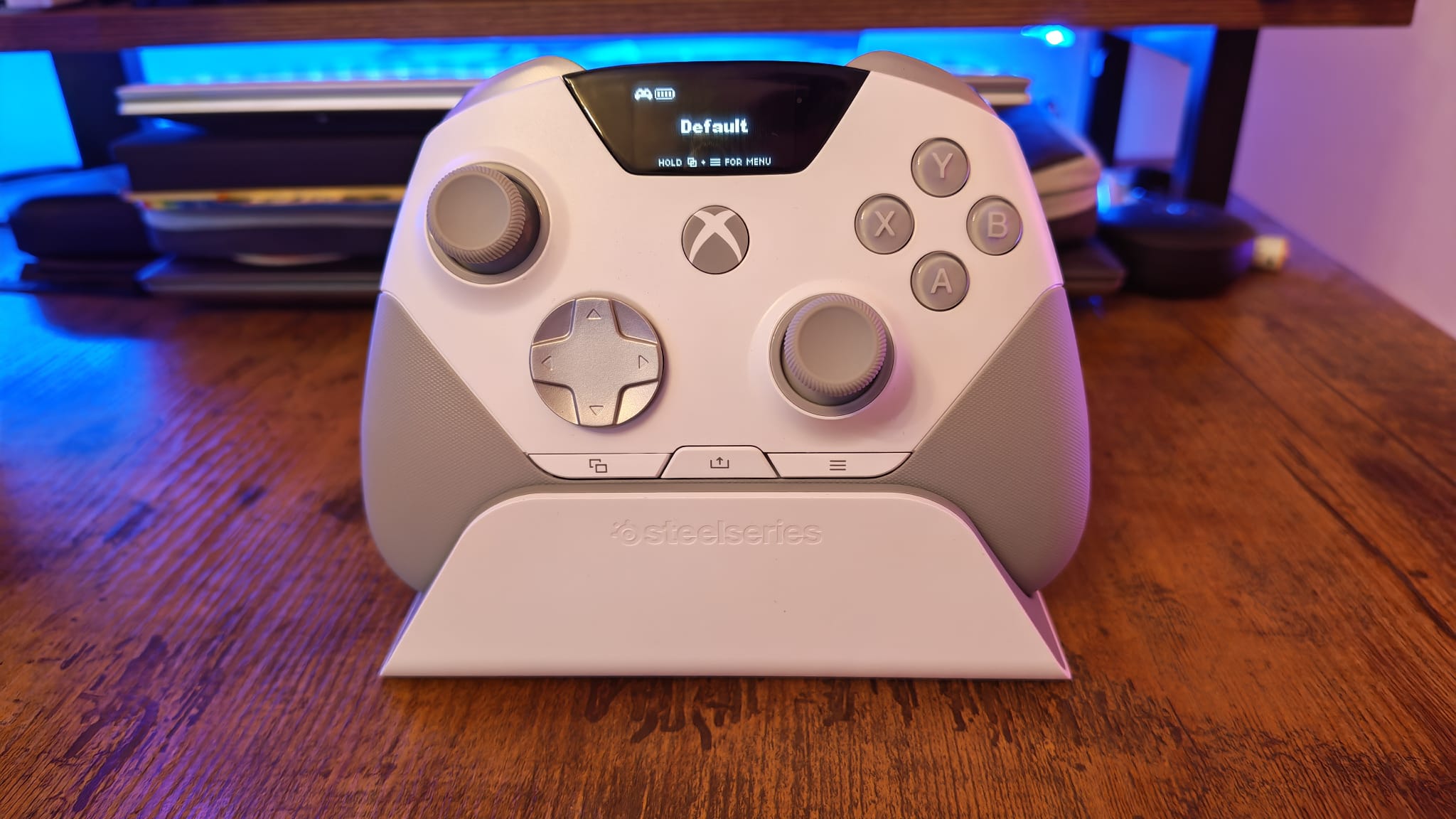 The SteelSeries Aeon Pro on its charging stand