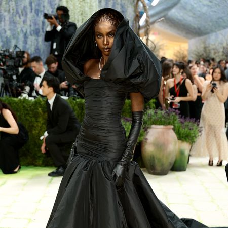 anok yai attending the met gala wearing robert kun