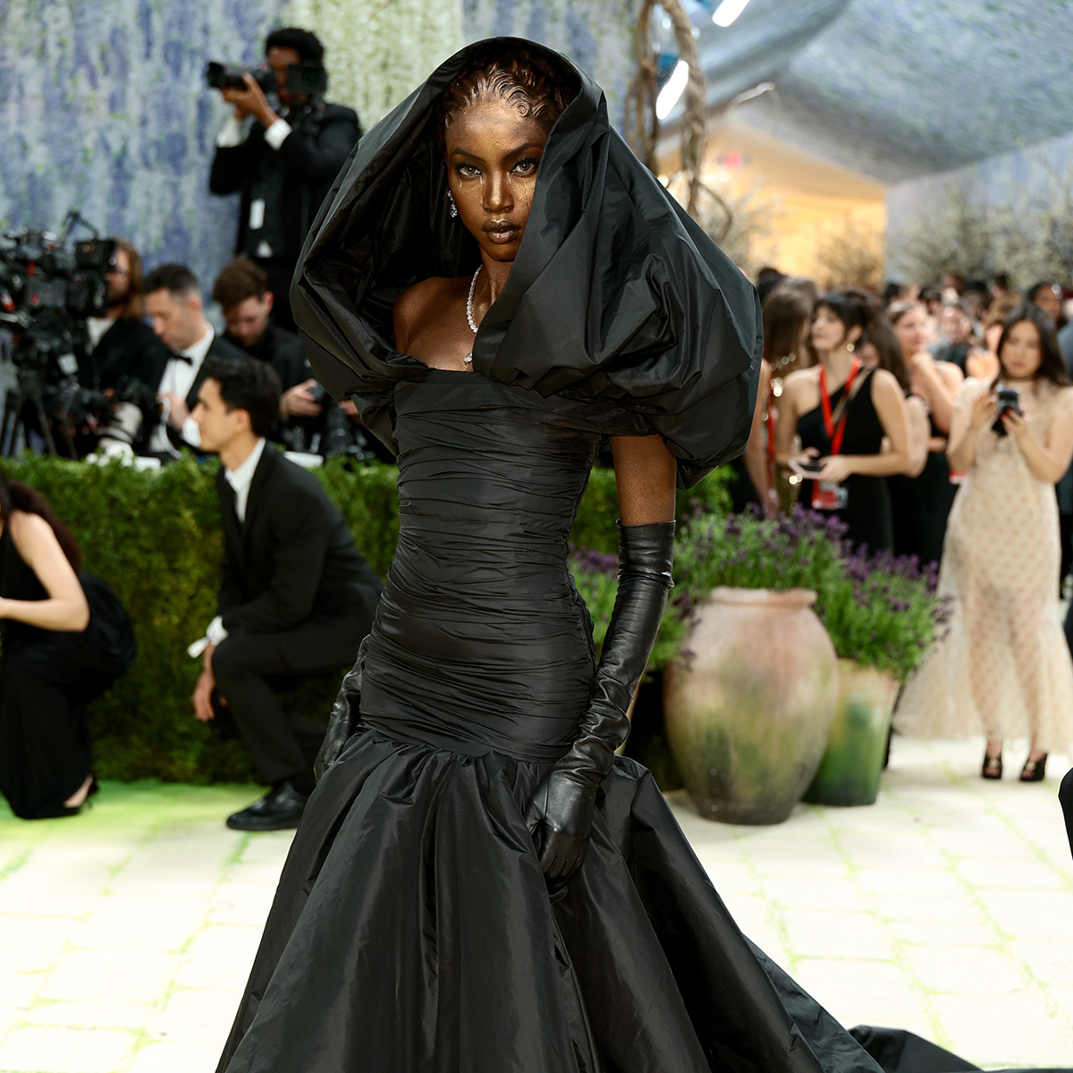 anok yai attending the met gala wearing robert kun