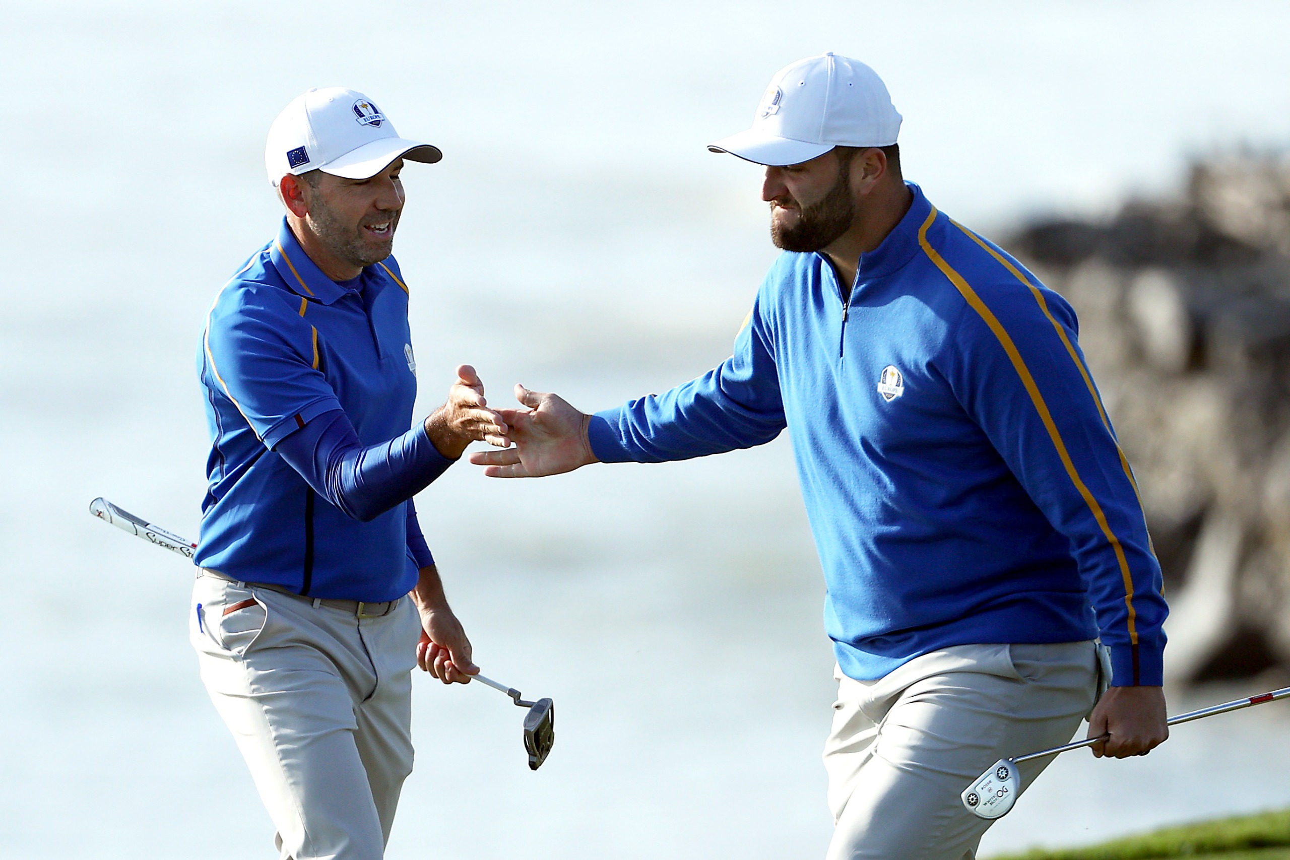 Sergio Garcia and Jon Rahm shake hands at the 2021 Ryder Cup