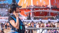 The Riedel OnAir headsets being used at a concert and mixing board. 