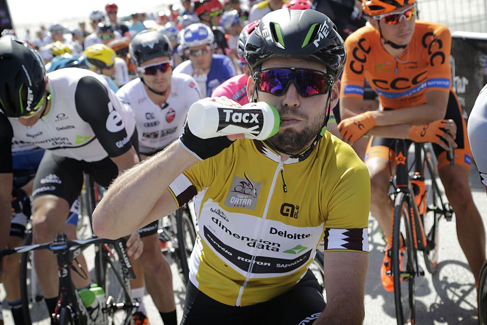 Mark Cavendish (Dimension Data) wears the leader's jersey at the start of stage 2 Tour of Qatar