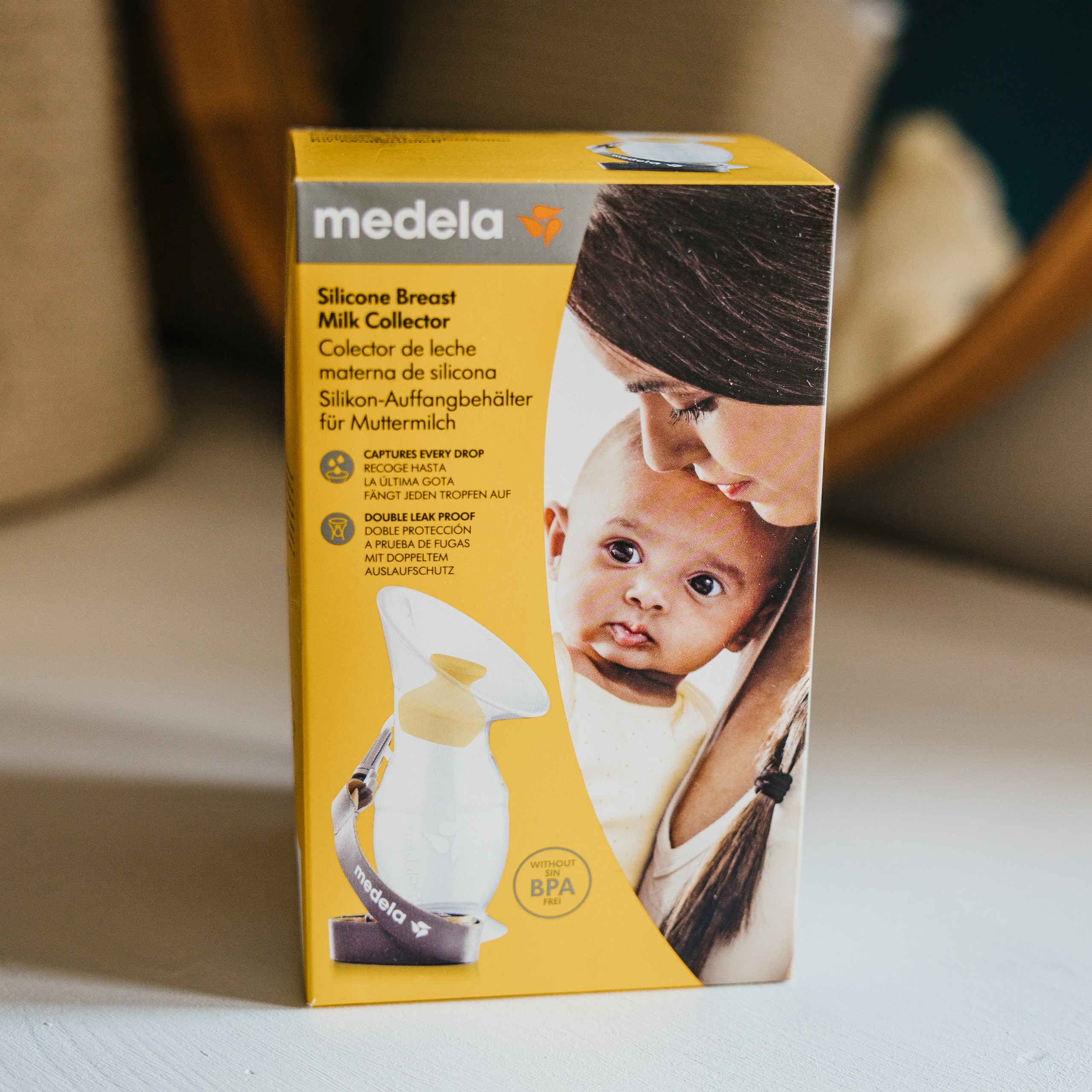 A close-up of the Medela breast milk collector