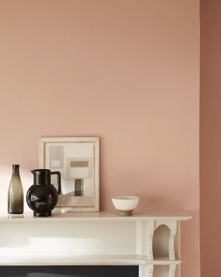 Masquerade pink paint colour on living room wall