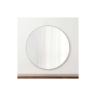 round mirror with brass edge