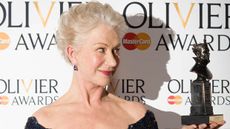 British actress Helen Mirren poses with her award for best actress during the Lawrence Olivier Awards for theatre at the Royal Opera House in London on April 28, 2013. AFP PHOTO / LEON NEAL(P
