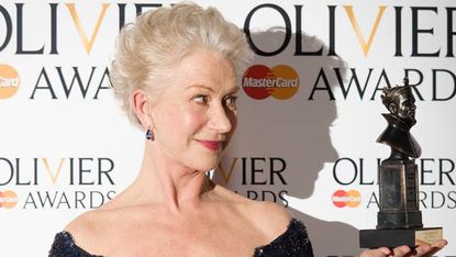 British actress Helen Mirren poses with her award for best actress during the Lawrence Olivier Awards for theatre at the Royal Opera House in London on April 28, 2013. AFP PHOTO / LEON NEAL(P