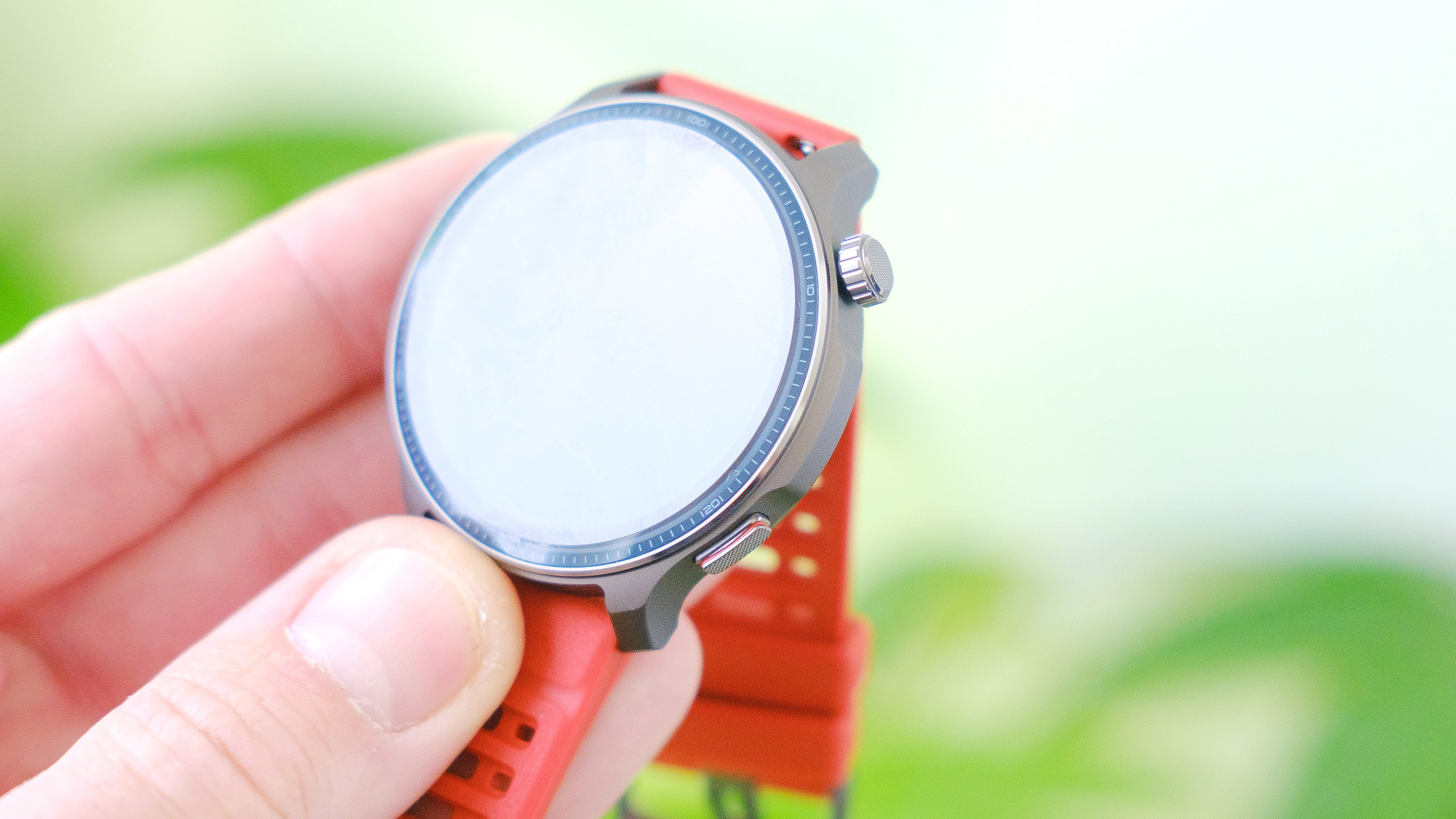 Close-up of the Amazfit Balance 2 smartwatch on an orange rubber strap