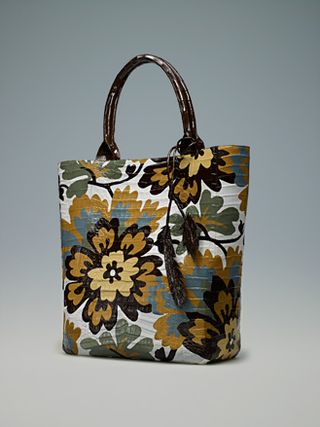 Bag with black, blue, green, and mustard yellow vintage floral design