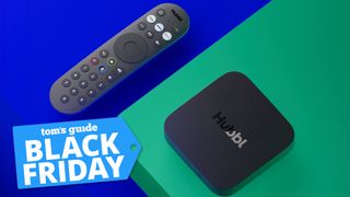 Hubbl Hub promotional image with streaming puck and remote and Tom&#039;s Guide Black Friday deal badge overlaid