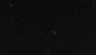 A tau Herculids meteor streaks across the sky in Charlotte, North Carolina on May 31, 2022.