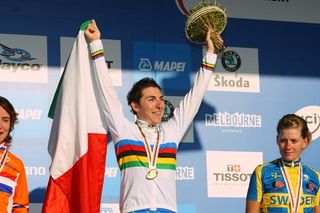 Italian, Giorgia Bronzini (Italy) stands on the top step of the podium, she now has track and world rainbow stripes.