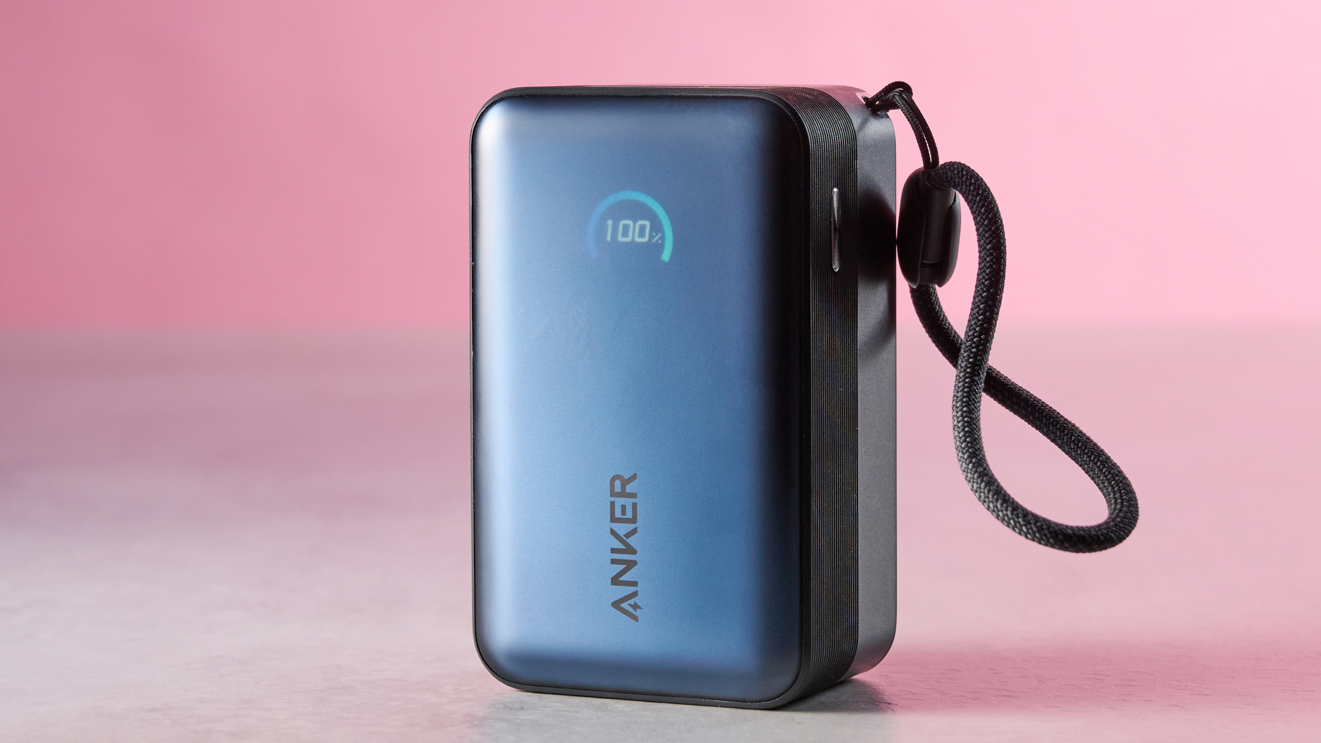 Anker Nano Power Bank 10K 45W Built-In Retractable USB-C Cable against pink background