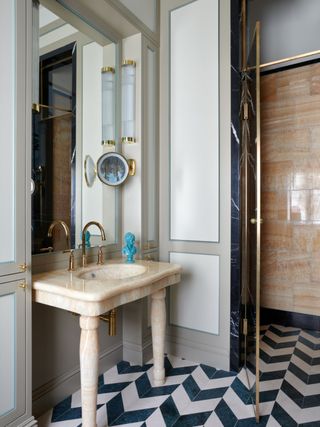 Small bathroom with large mirror